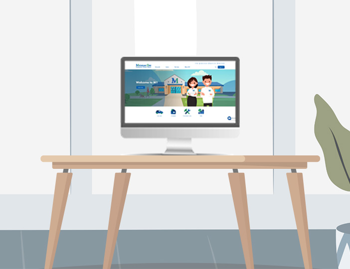 Desktop computer on office desk displaying M1 Credit Union’s iTeller online banking portal for secure digital account access