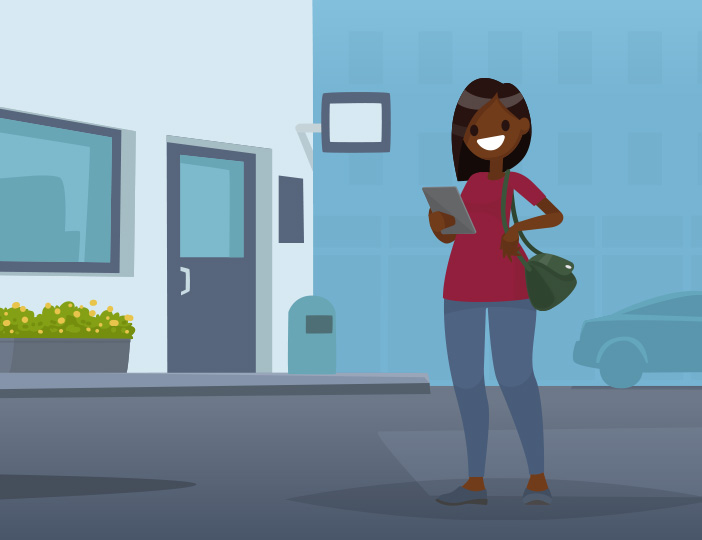 Woman walking downtown using iPad to access additional eServices from M1 Credit Union for convenient digital banking on the go.