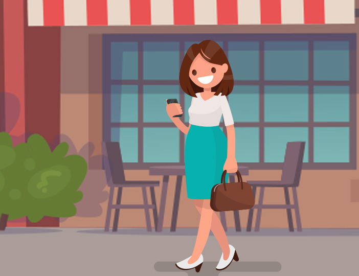 Woman walking downtown while using Zelle on her smartphone for fast and easy mobile money transfer.