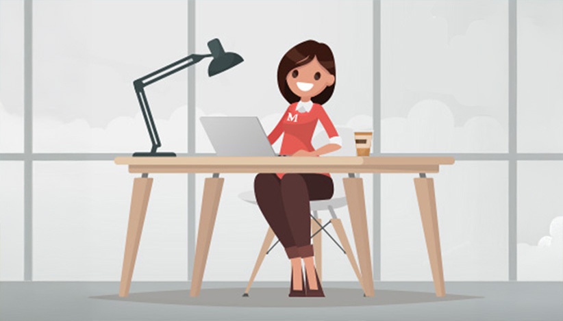 M1 Credit Union team member focused at their desk, demonstrating dedication and professionalism in a supportive workplace environment.