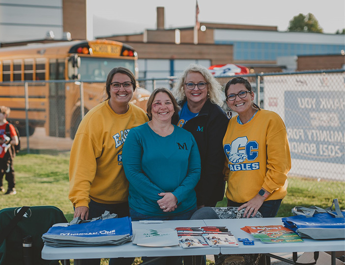 M1 Carson City staff team volunteering together, supporting the local community through hands-on service and teamwork.